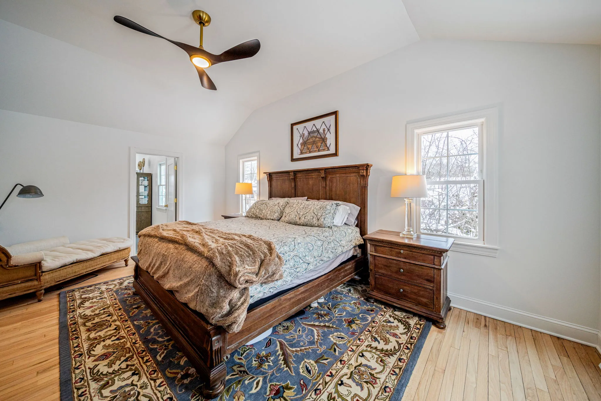Master bedroom with vaulted ceiling — whole-home renovation